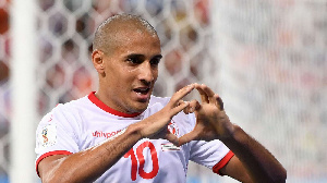 Wahbi Khazri's deflected free-kick earned Tunisia a 1-1 draw in Group E