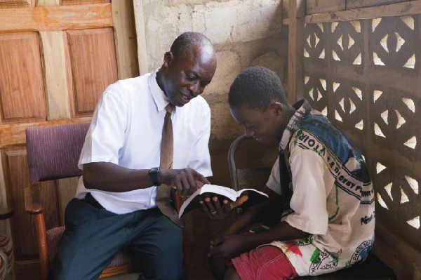 Father and son reading