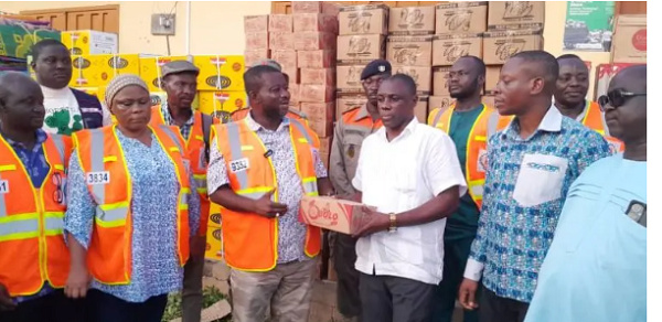 NADMO director and some of the beneficiaries