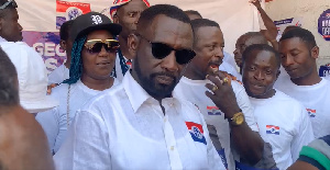 COP (rtd) George Alex Mensah (in dark shades) during submission of his forms