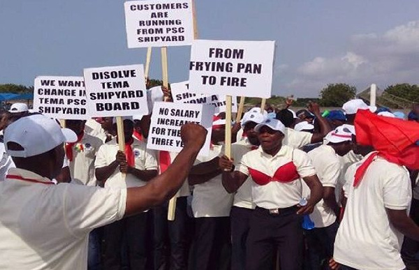 Some workers of the Tema Shipyard displaying placards during May Day