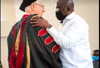 Vice President Dr Mahamudu Bawumia embraces Rev. Fr. Andrew Campbell