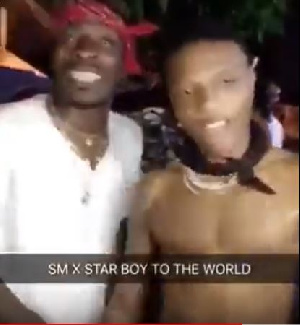 Shatta Wale having fun with his 'new friend', Wizkid