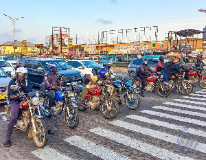 Motor Riders In Traffic 