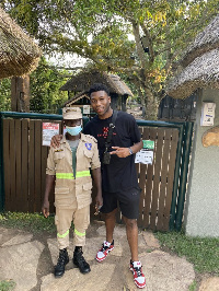 Ghana international Timothy Fosu-Mensah (R)