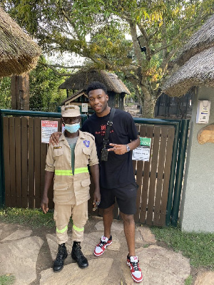 Ghana international Timothy Fosu-Mensah (R)