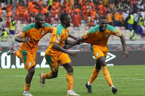 Ivorian players celebrate one of their goals