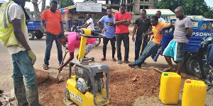 The young men working on the road