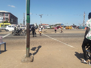 File photo/People walking by the roadside