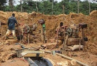 Some Galamsey operators at a mining site