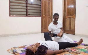 Thai Massage expert Yaw Tutu working on a client.