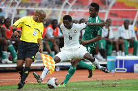 Mikel Obi and Anthony Annan during the 2008 World Cup