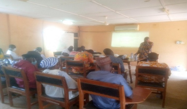 Philip Ayamba, the Programme Coordinator, ZOFA addressing the farmers