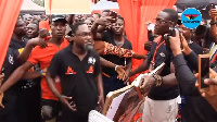 Countryman Songo [middle] at Ebony's one week commemoration