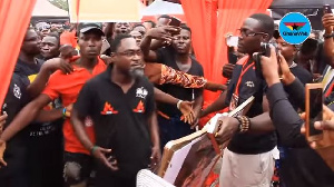 Countryman Songo [middle] at Ebony's one week commemoration