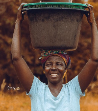 A Fishmonger carrying her basket