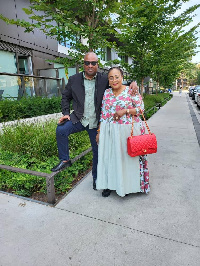 The couple, John and Lordina Mahama, pose for the camera