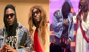 Mmebusem surprised Medikal on stage during his performance