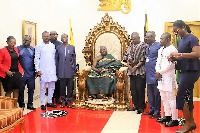 Otumfuo Osei Tutu II with officials from MIIF