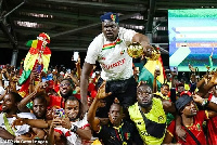 Guinea fans celebrating at the AFCON