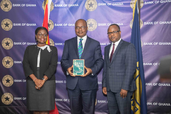 Governor of the Bank of Ghana, Dr Ernest Addison, flanked by his two deputies