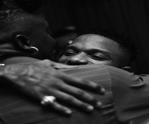 Ghanaian dancehall artiste, Stonebwoy hugging Nigeria's Wizkid: Photo via Instagram