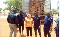 Helena Huang with some police officials