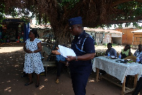 Somanya Police Commander,  ASP Isaac Otsin addressing the gathering