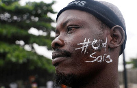 A demonstrator protests against Nigeria's Special Anti-Robbery Squad (SARS) in Lagos