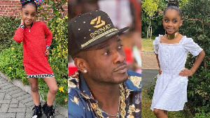 Black Stars striker , Asamoah Gyan and his daughter