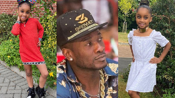 Black Stars striker , Asamoah Gyan and his daughter