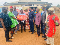 McDan Foundation presenting bags of rice to the Gbewaa palace