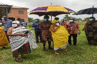 Paramount Queen mother of Ejisu Nana Yaa Asantewaa II (draped in yellow)