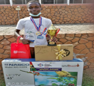 Benjamin Nartey with his awards