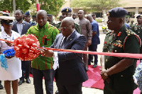 Presiden Akufo-Addo performing the tape cutting ceremony when he addressed Service Chiefs, Officers