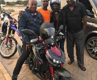 Former President, John Dramani Mahama with some okada riders