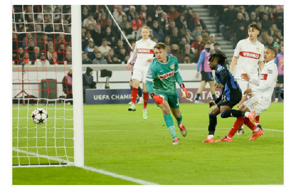 Ademola Lookman (3-R) of Atalanta scores the opening goal against goalkeeper Stuttgart