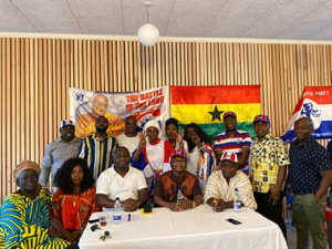 Members of the party with National Chairman Freddy Blay in a group photograph