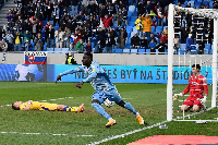 Malik Abubakari celebrates