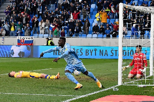 Malik Abubakari celebrates