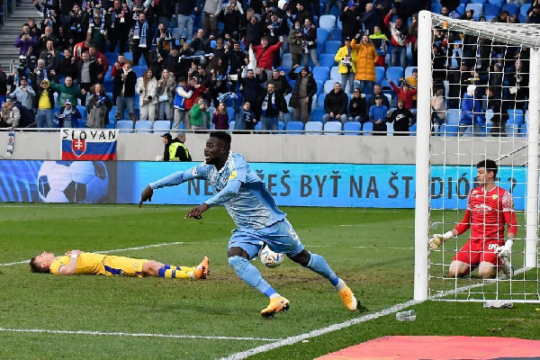 Malik Abubakari celebrates