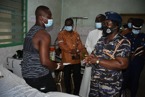 IGP James Oppong-Boanuh, Snr Police Officers with policemen who were injured with gunshot wounds