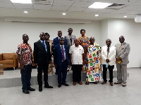 Kwaku Agyeman Manu, Minister of Health poses with the Board Members