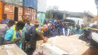 Customs Division of GRA officials inspecting the consignments