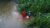 Some residents fetching water from the polluted river