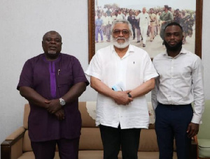 Former President Jerry John Rawlings with son of late  John Evans Atta-Mills