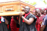 National Youth Organizer of the NPP, Sammy Awuku and others carrying a coffin