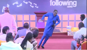 Pastor shows off his dance skills to his congregation