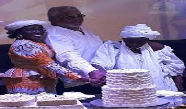 Mother of former President Jerry John Rawlings, Madam Victoria Agbotui cutting her cake