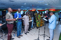 George Mireku Duker swearing in members of the committee